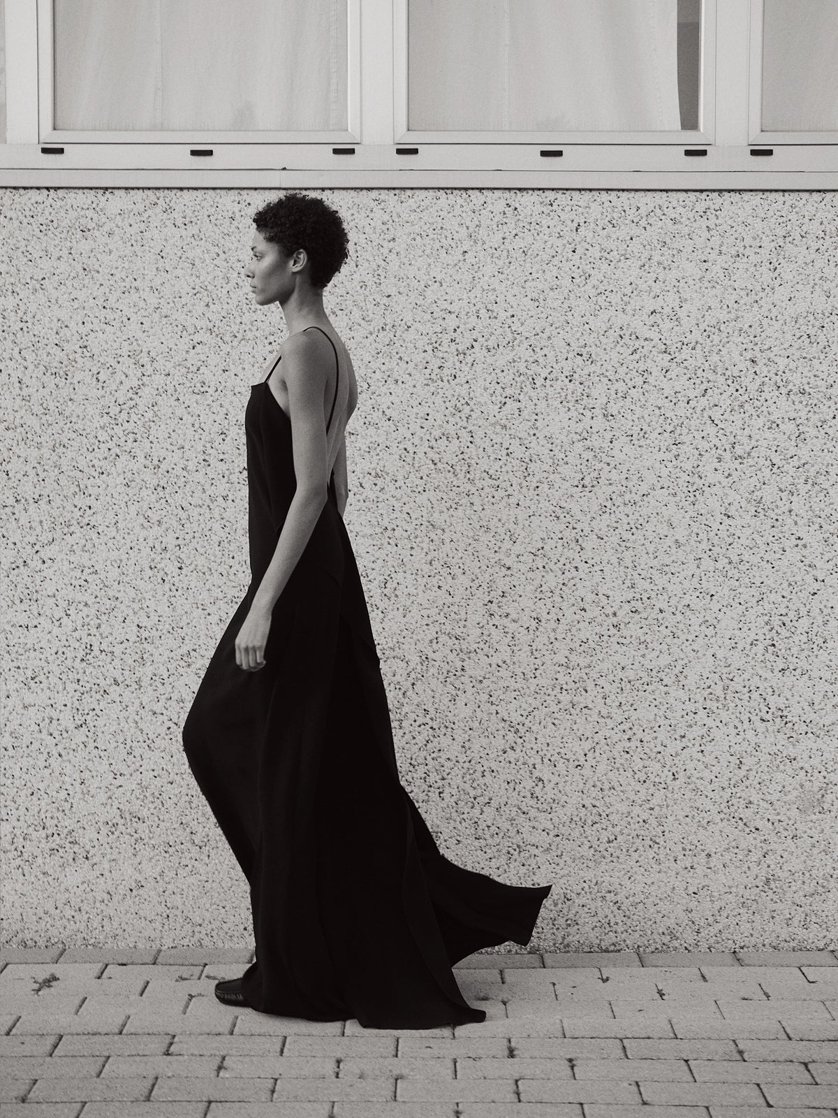 LAFINE dresses made in Italy in smooth fluid textiles. Designed by Yvonne Koné.