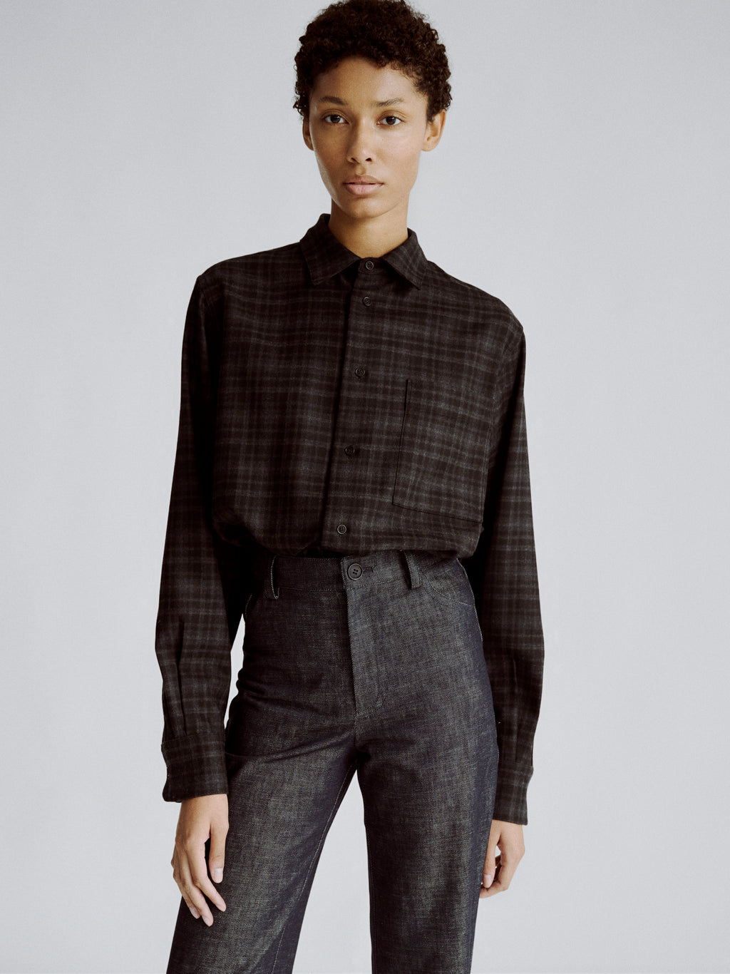 LAFINE Crisp Shirt in Onyx check wool. Designed by Yvonne Koné. Made in Italy.