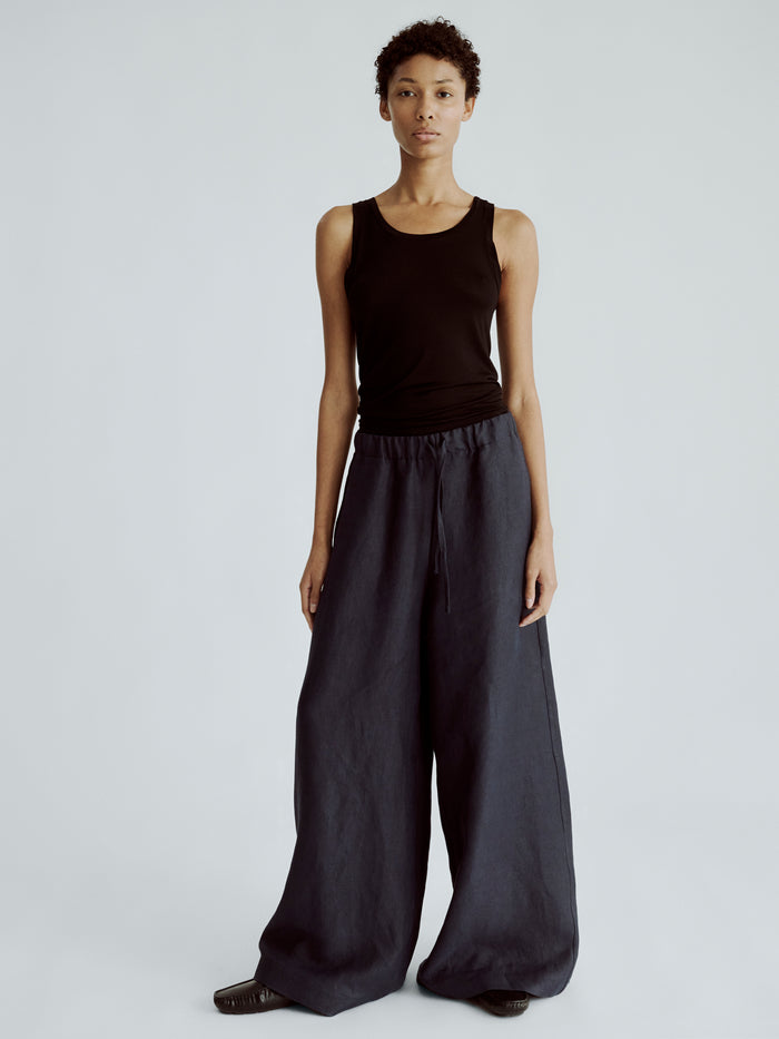 LAFINE Flowy Pants in Deep Blue linen. Designed by Yvonne Koné. Made in Italy.