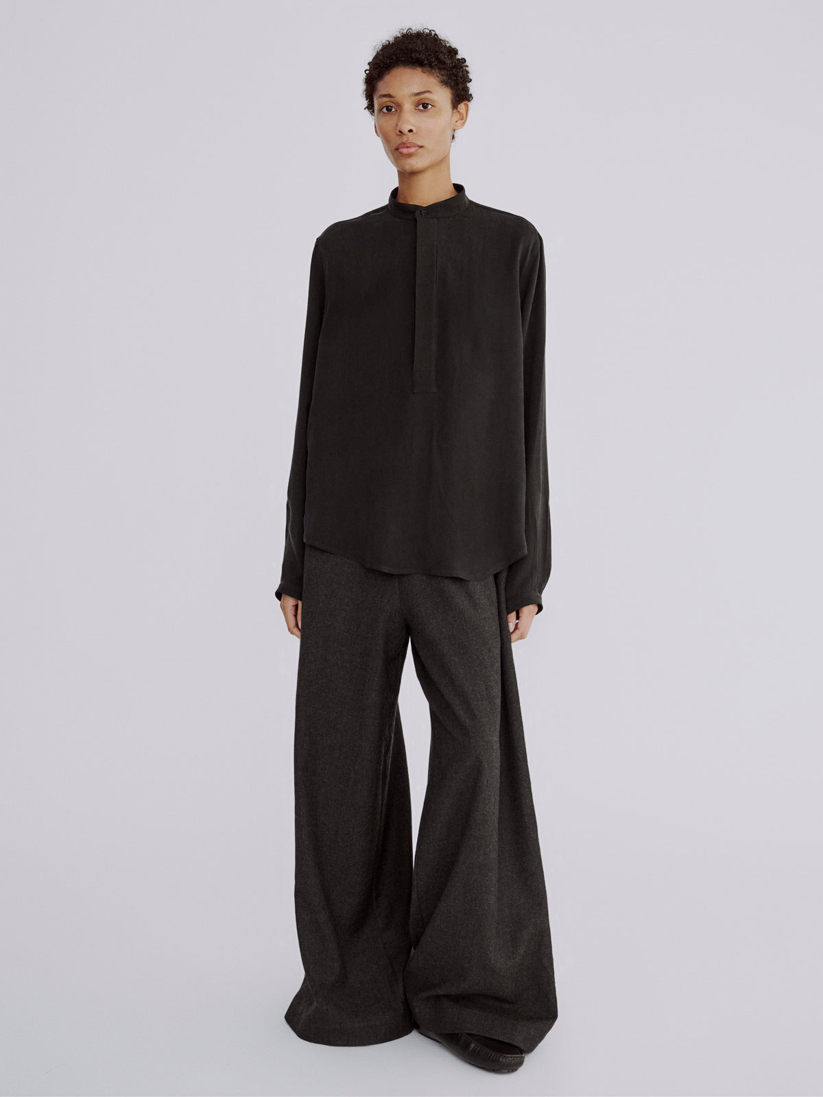 LAFINE Pop Shirt in Black cupro. Designed by Yvonne Koné. Made in Italy.