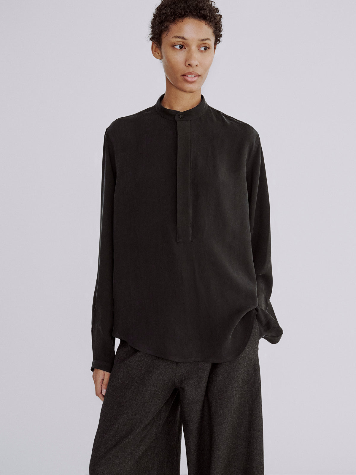 LAFINE Pop Shirt in Black cupro. Designed by Yvonne Koné. Made in Italy.