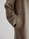 LAFINE Coat in Stone cashmere. Designed by Yvonne Koné. Made in Italy.
