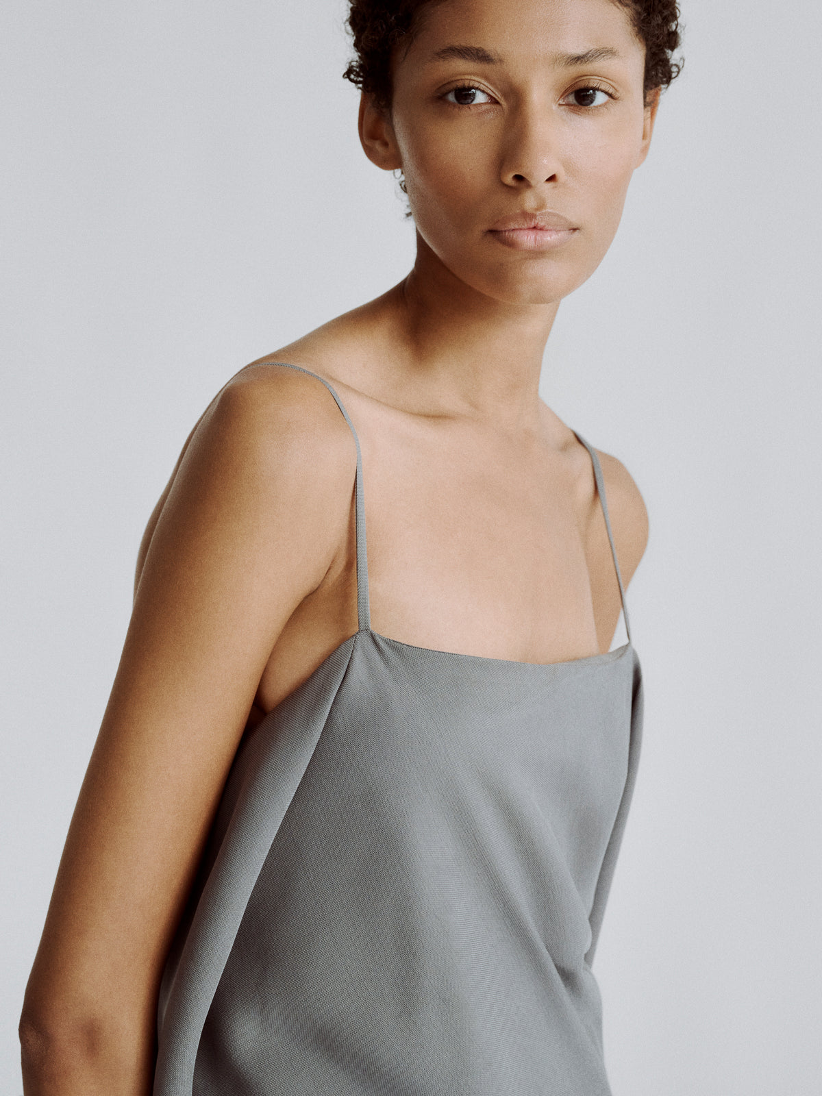 LAFINE Dress in Steel Grey cupro. Designed by Yvonne Koné. Made in Italy.