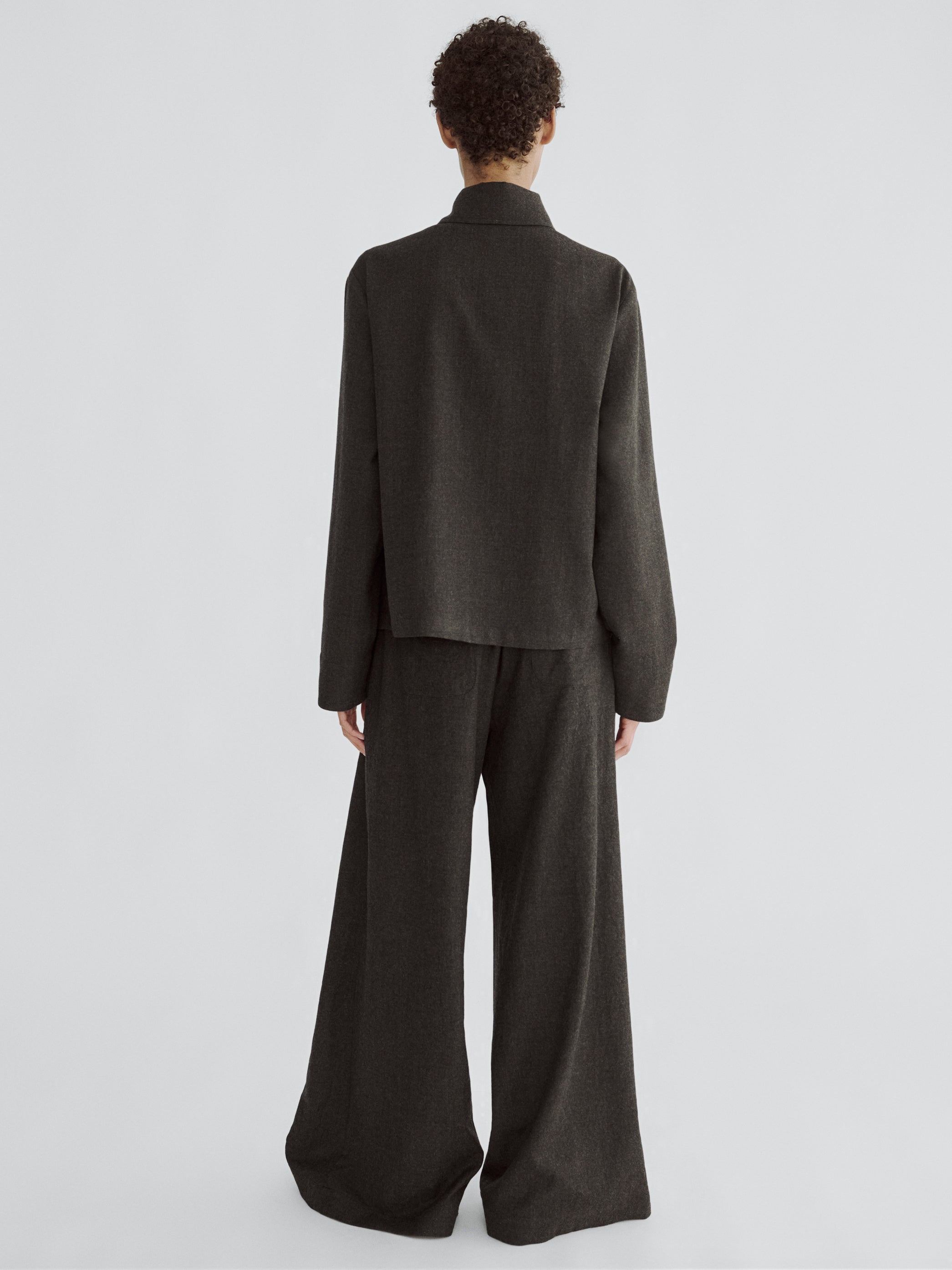 LAFINE Flowy Pants in Onyx wool. Designed by Yvonne Koné. Made in Italy.