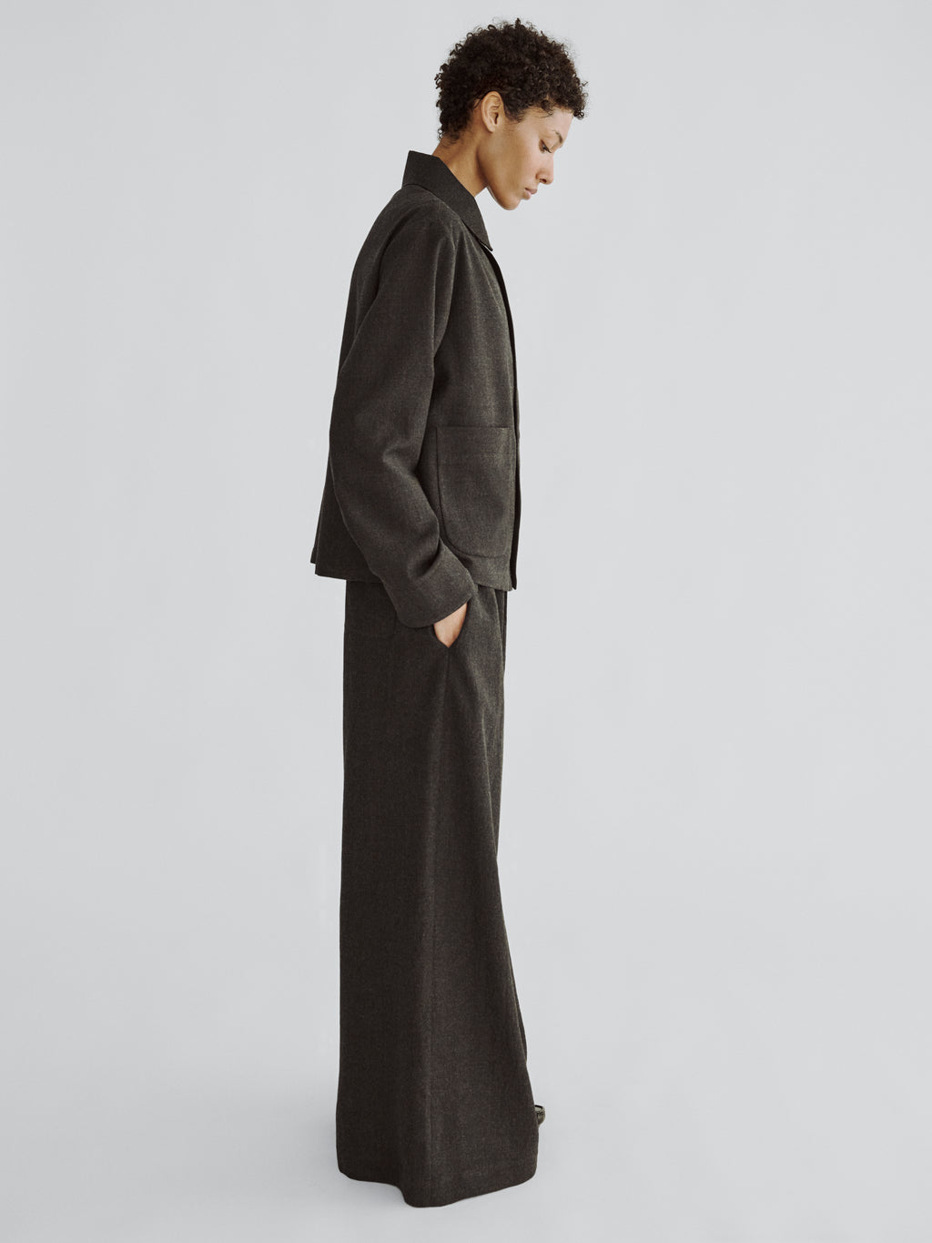 LAFINE Set Jacket in Onyx lightweight wool. Designed by Yvonne Koné. Made in Italy.