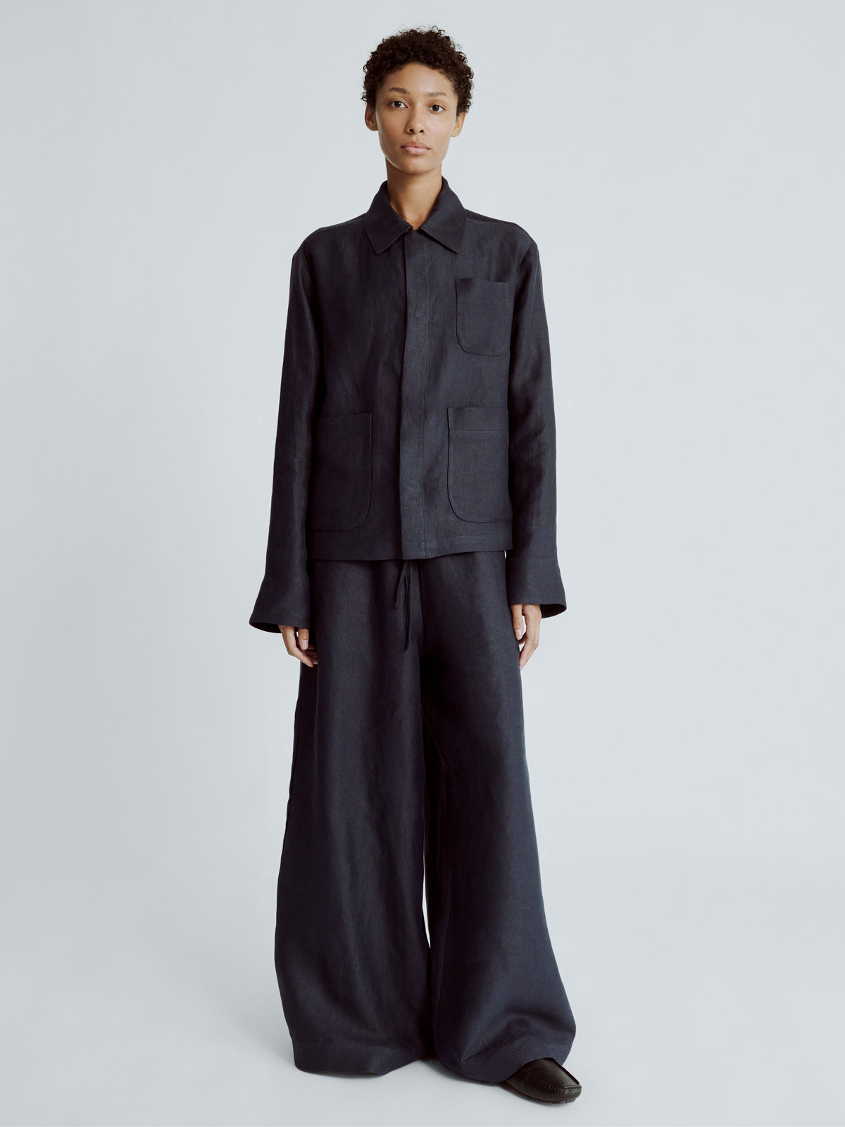 LAFINE Flowy Pants in Deep Blue linen. Designed by Yvonne Koné. Made in Italy.